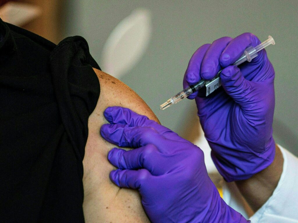 Would it be legal to charge an unvaccinated person for hospitalization?